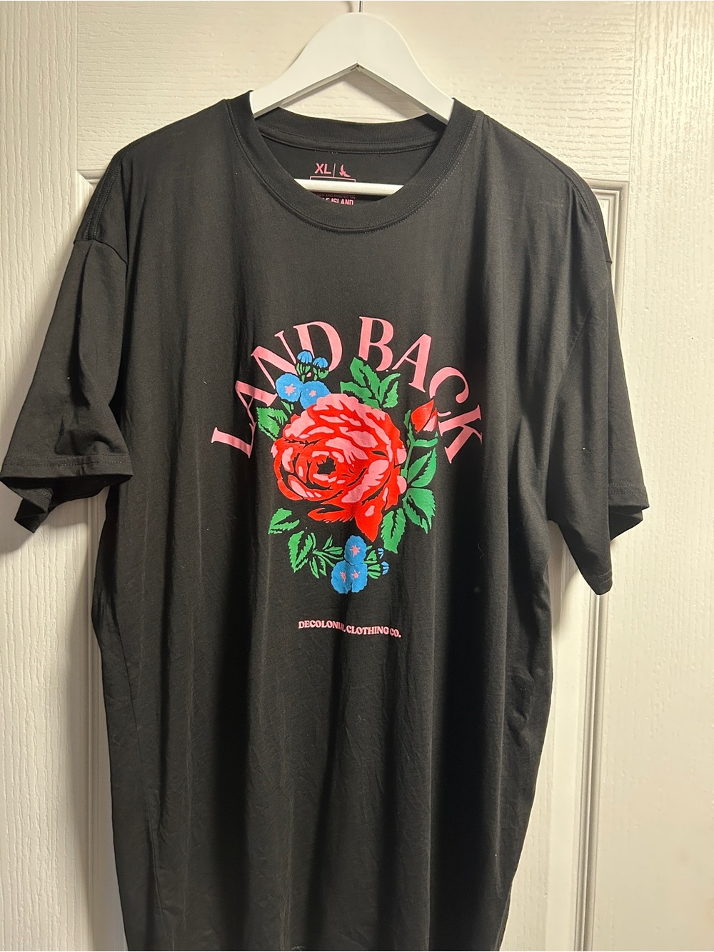 Black 'Land Back' Graphic Tee with Red Rose by